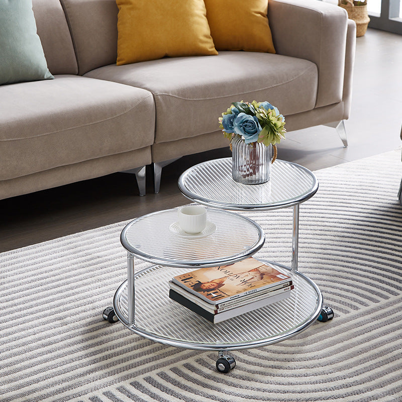 Table basse rotative moderne de style milieu du siècle avec plateau rond en verre nervuré à 2 niveaux avec roulettes pour salon 