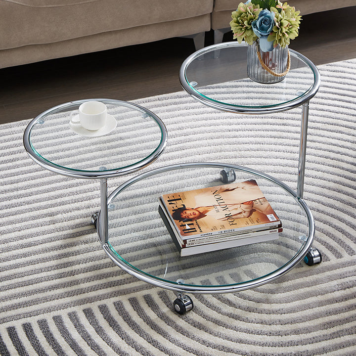 Table basse rotative moderne de style milieu du siècle avec plateau rond en verre nervuré à 2 niveaux avec roulettes pour salon 