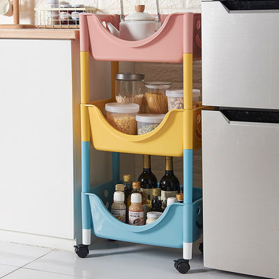 Mesa auxiliar de plástico escandinava contemporánea con ruedas de 3 niveles para almacenamiento de juguetes y bocadillos para la sala de estar 