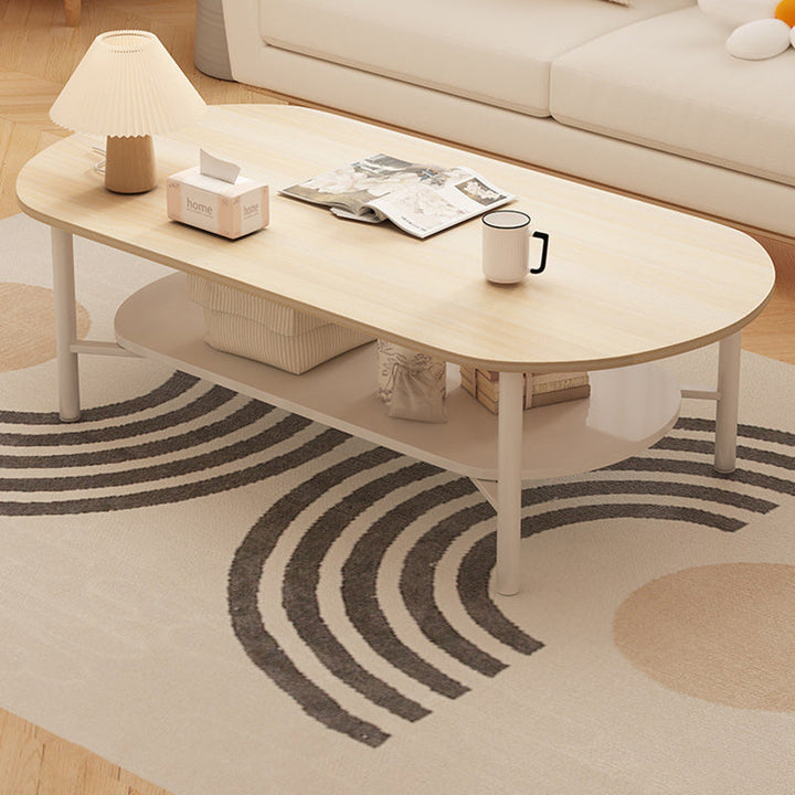 Moderner minimalistischer cremefarbener ovaler Kohlenstoffstahl-Dichteteller-Couchtisch mit 2 Ebenen für das Wohnzimmer 