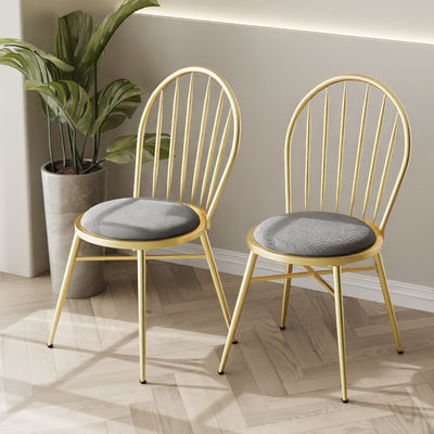 Silla de comedor contemporánea nórdica con respaldo hueco y estructura de acero al carbono tapizada para comedor 