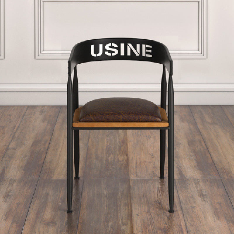 Silla de comedor contemporánea nórdica con estructura de hierro redonda y tapizada en cuero sintético con respaldo y reposabrazos para comedor 