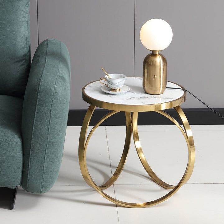 Table basse moderne de luxe en marbre avec base ronde en titane et acier inoxydable pour salon 