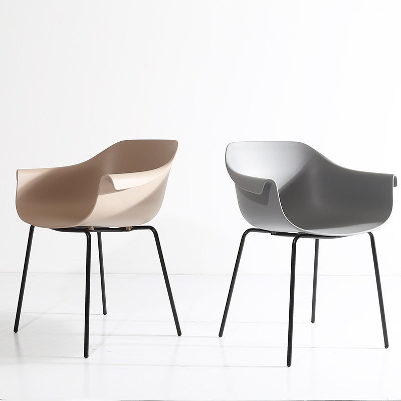 Modern Minimalist PP Seat Back Integrated Arms Steel Base Dining Chair - Ergonomic Curved Back Chair For Dining Room