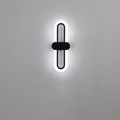 Applique murale LED en fer acrylique ovale de simplicité contemporaine pour salon 