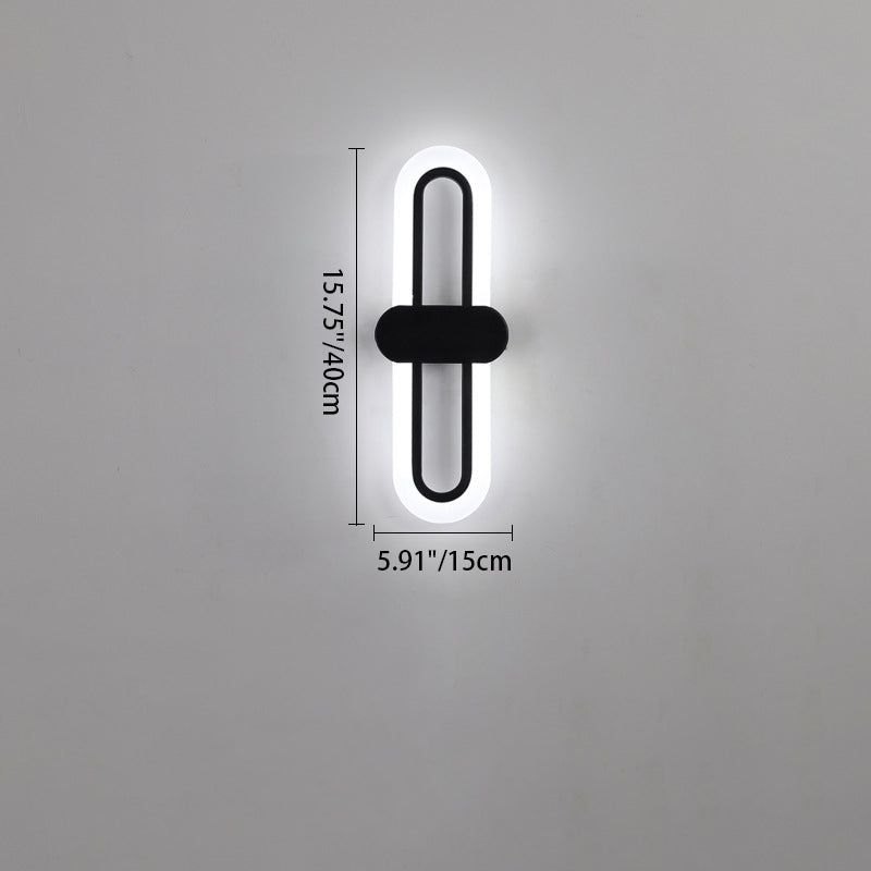 Applique murale LED en fer acrylique ovale de simplicité contemporaine pour salon 