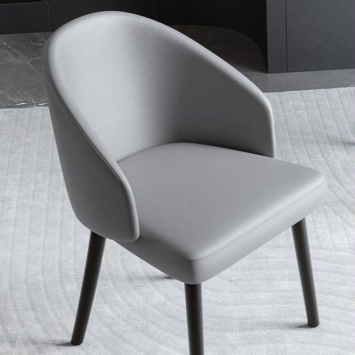 Zeitgenössischer nordischer Trapezkissen PU-Leder Eschenholz Esszimmerstuhl Rückenlehne für Esszimmer 