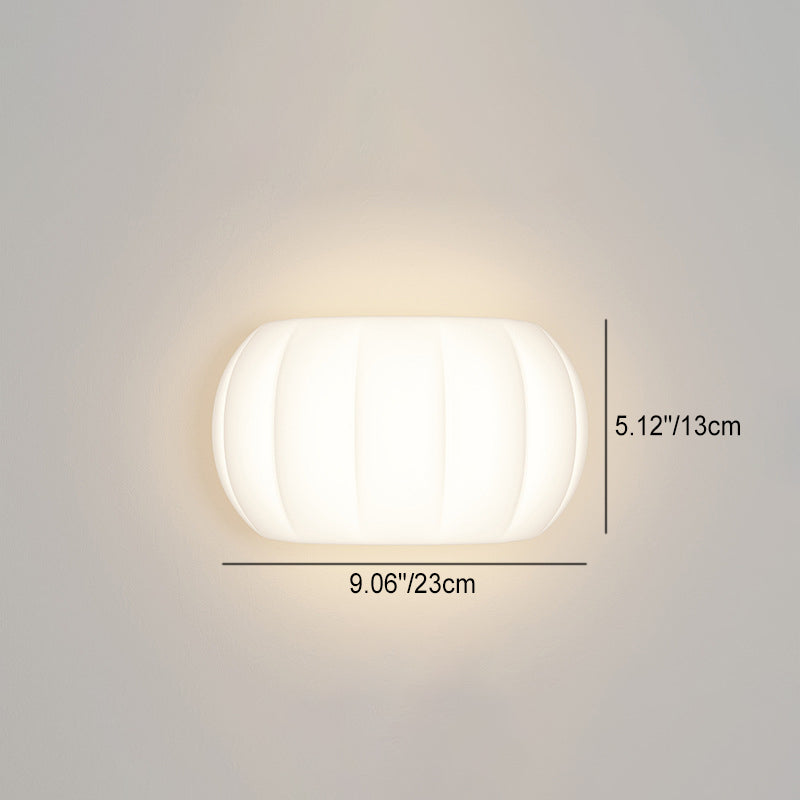 Applique murale LED elliptique en forme de citrouille en fer et acrylique de simplicité moderne pour chevet 