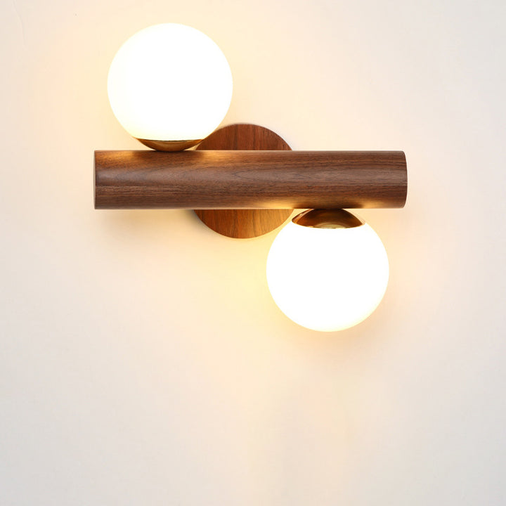Traditional Japanese Metal Rubber Wood Walnut Glass Cylinder Strip Ball 2-Light Wall Sconce Lamp For Bedside