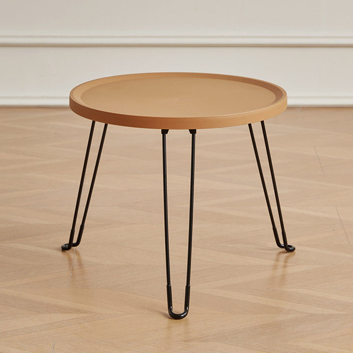 Table basse moderne minimaliste ronde en acier au carbone PP pliable pour salon 