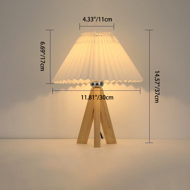 Lámpara de mesa de 1 luz con pantalla de tela plisada trapezoidal minimalista moderna y trípode de madera para dormitorio 
