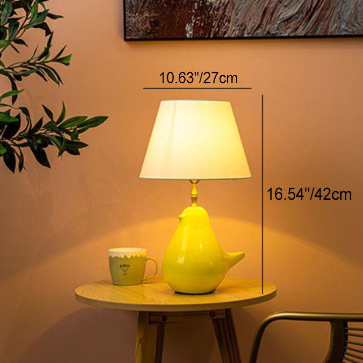 Lampe de table à 1 lumière avec base en céramique et abat-jour cylindrique en tissu créatif contemporain pour chambre 