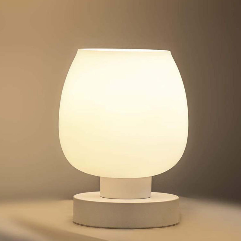 Moderne minimalistische flache runde Glaseisen 1-Licht Tischlampe für Wohnzimmer 
