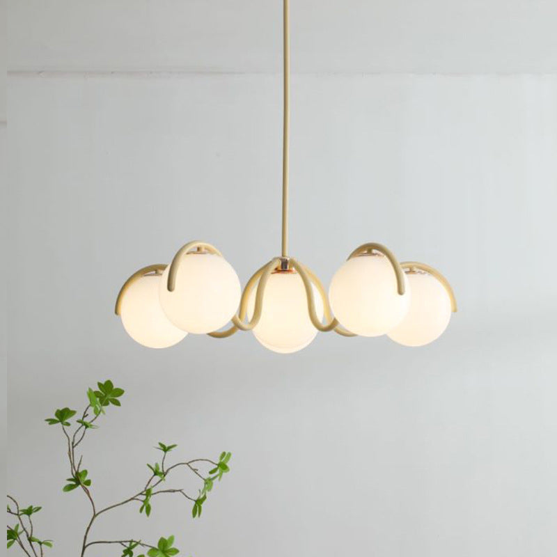 Moderner minimalistischer Kronleuchter mit geschwungenen Kugeln aus Metall und Glas mit 6 Lichtern für das Wohnzimmer 