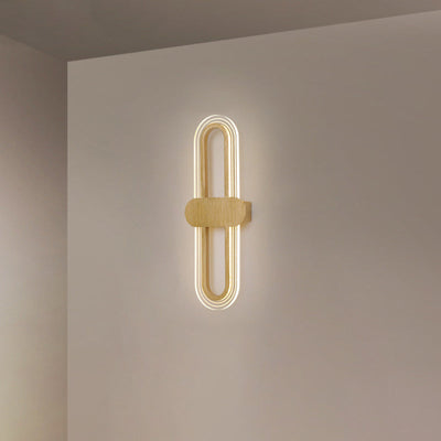 Applique murale LED en fer acrylique ovale de simplicité contemporaine pour salon 