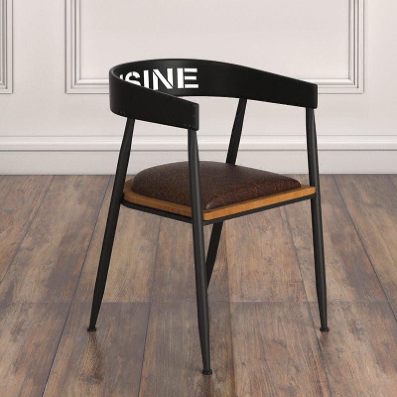 Silla de comedor contemporánea nórdica con estructura de hierro redonda y tapizada en cuero sintético con respaldo y reposabrazos para comedor 