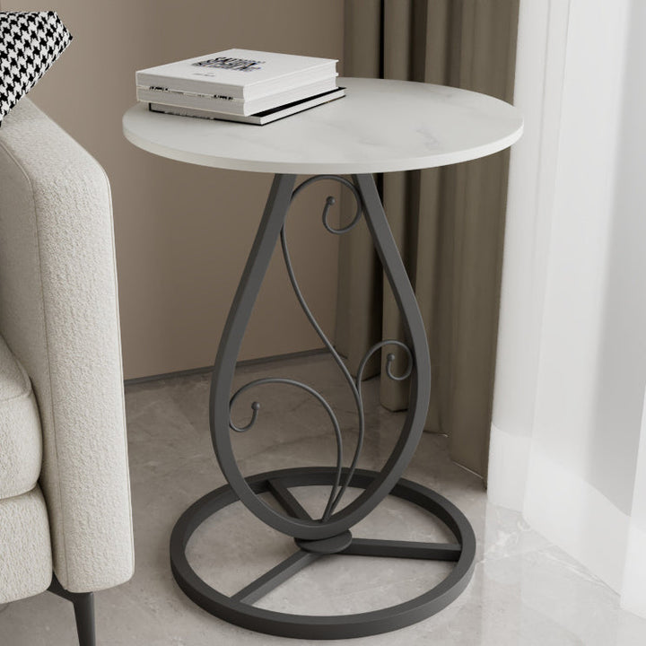Table basse moderne de luxe ronde avec plateau en pierre frittée et base en métal pour salon 