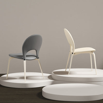 Contemporáneo Nórdico Redondo Tapizado en Cuero Sintético Patas de Acero al Carbono Silla de Comedor Respaldo Sin Brazos Para Comedor 