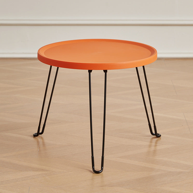 Table basse moderne minimaliste ronde en acier au carbone PP pliable pour salon 