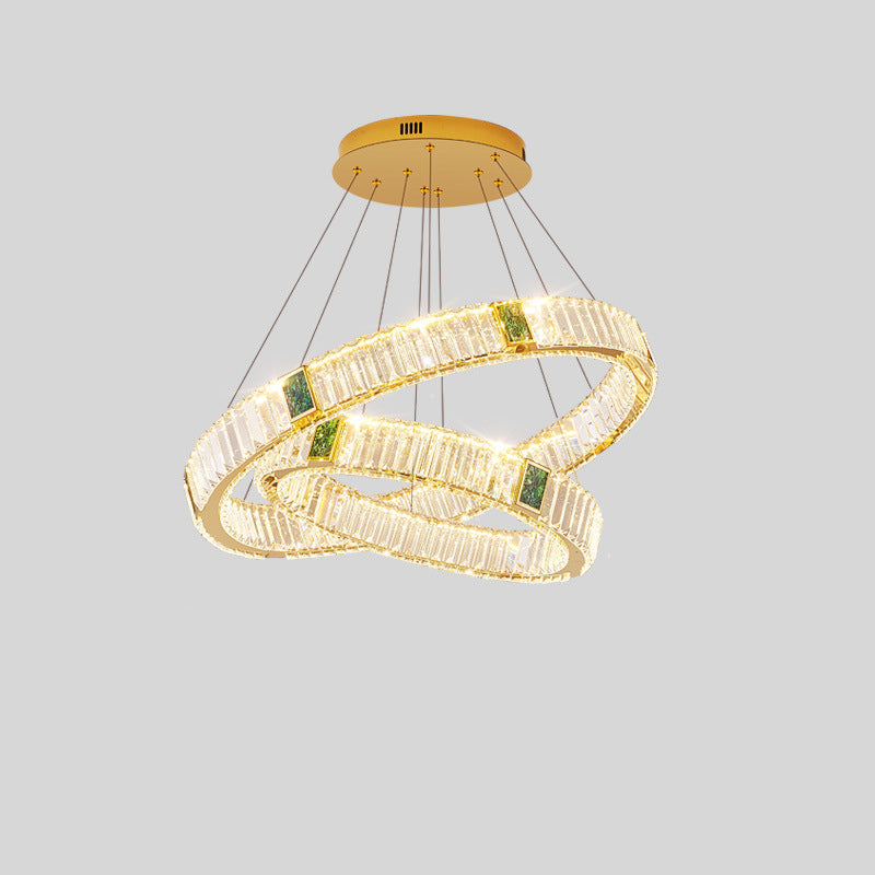 Lustre LED en cristal moderne de luxe rond en cristal titane en acier inoxydable pour salon 