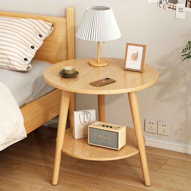 Table basse en bois moderne minimaliste avec plateau rond et base triangulaire à deux niveaux pour salon 