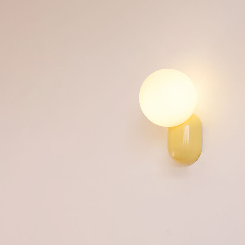 Macaron-Creme-Stil Harz-Glaskugel 1-Licht Wandleuchte 