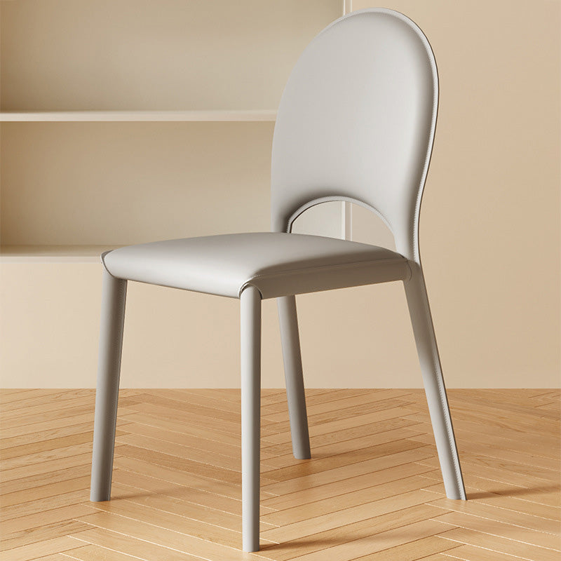Moderner minimalistischer quadratischer ovaler Rücken aus echtem Leder Kohlenstoffstahl Esszimmerstuhl für das Esszimmer 