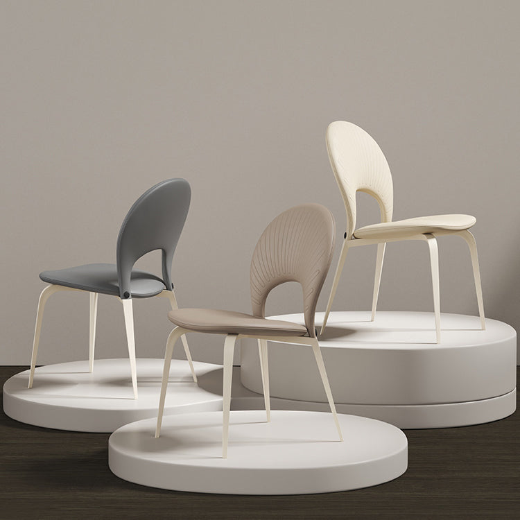 Contemporáneo Nórdico Redondo Tapizado en Cuero Sintético Patas de Acero al Carbono Silla de Comedor Respaldo Sin Brazos Para Comedor 