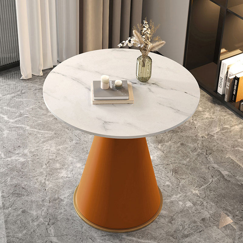 Table basse contemporaine de luxe avec plateau rond en pierre frittée et base en métal pour salon 