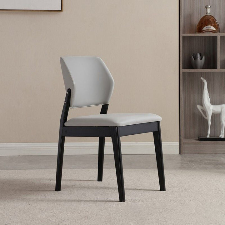 Chaise de salle à manger contemporaine nordique en similicuir rembourré avec dossier ouvert sans accoudoirs pour salle à manger 