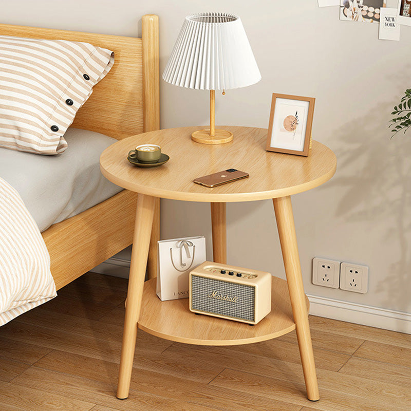 Table basse en bois moderne minimaliste avec plateau rond et base triangulaire à deux niveaux pour salon 