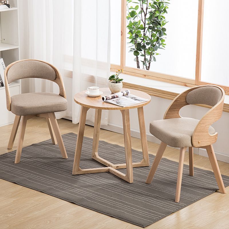 Silla de comedor con patas de madera contemporáneas nórdicas tapizadas en tela, respaldo curvado para comedor 