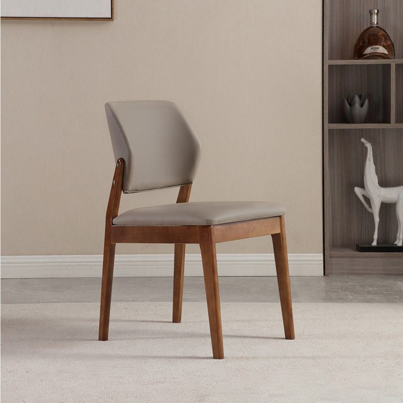 Chaise de salle à manger contemporaine nordique en similicuir rembourré avec dossier ouvert sans accoudoirs pour salle à manger 