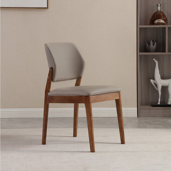 Chaise de salle à manger contemporaine nordique en similicuir rembourré avec dossier ouvert sans accoudoirs pour salle à manger 