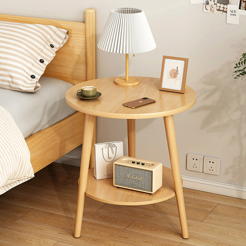 Table basse en bois moderne minimaliste avec plateau rond et base triangulaire à deux niveaux pour salon 