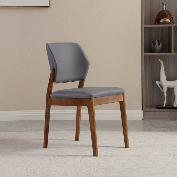 Chaise de salle à manger contemporaine nordique en similicuir rembourré avec dossier ouvert sans accoudoirs pour salle à manger 