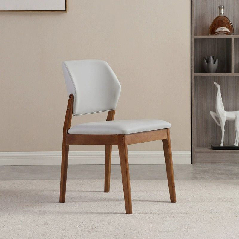 Chaise de salle à manger contemporaine nordique en similicuir rembourré avec dossier ouvert sans accoudoirs pour salle à manger 