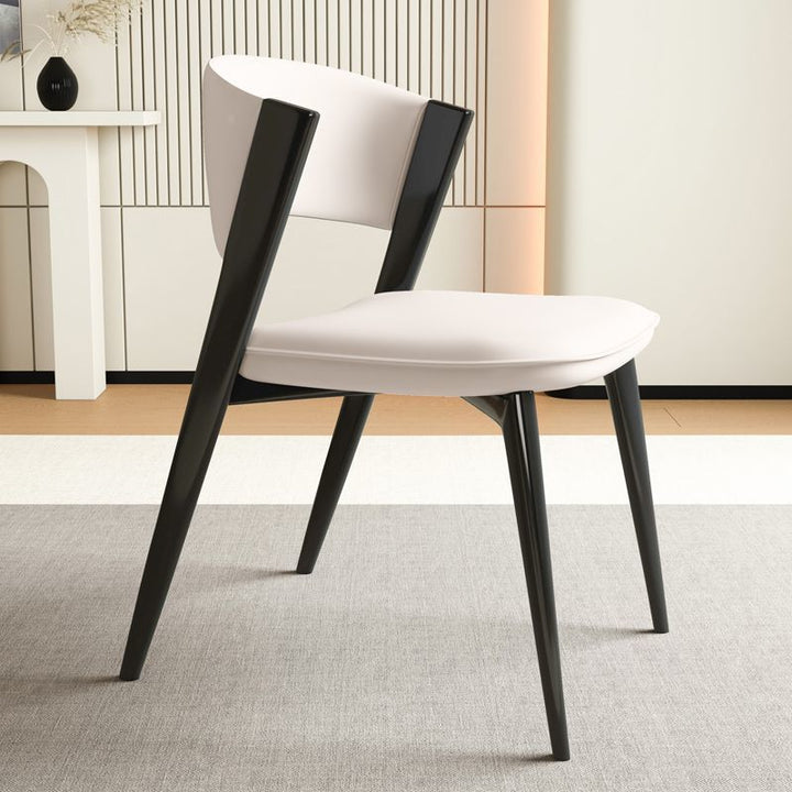 Moderner minimalistischer geschwungener rechteckiger Mikrofasersessel aus Leder und Kohlenstoffstahl ohne Armlehnen für das Esszimmer 