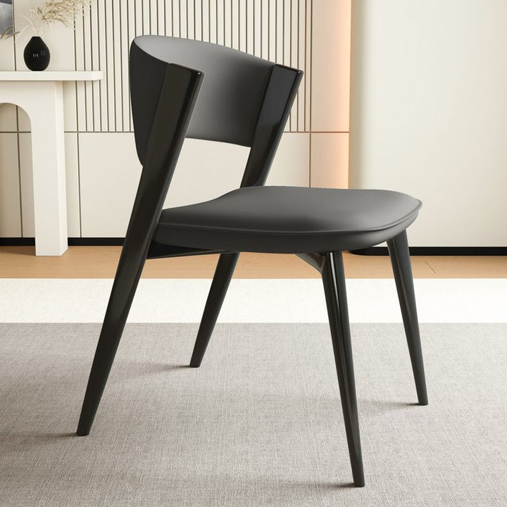 Moderner minimalistischer geschwungener rechteckiger Mikrofasersessel aus Leder und Kohlenstoffstahl ohne Armlehnen für das Esszimmer 