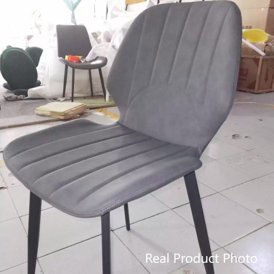 Moderner luxuriöser Esszimmerstuhl aus PU-Leder, Sperrholz und Karbonstahl mit gerippter Rückenlehne für das Wohnzimmer 