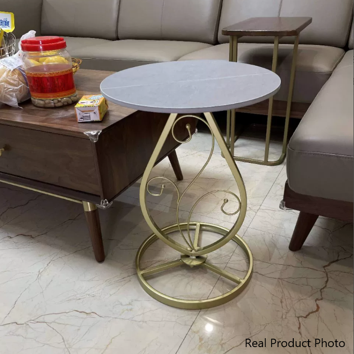Table basse moderne de luxe ronde avec plateau en pierre frittée et base en métal pour salon 