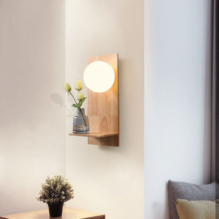 Moderne nordische 1-flammige Wandleuchte mit Glaskugel, Holz und quadratischer Basis für Schlafzimmer und Wohnzimmer 