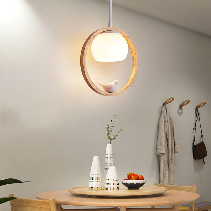 Moderne nordische Pendelleuchte mit Glas, Kautschukholz-Ring und Vogel-Design, 1-flammig, für das Wohnzimmer 