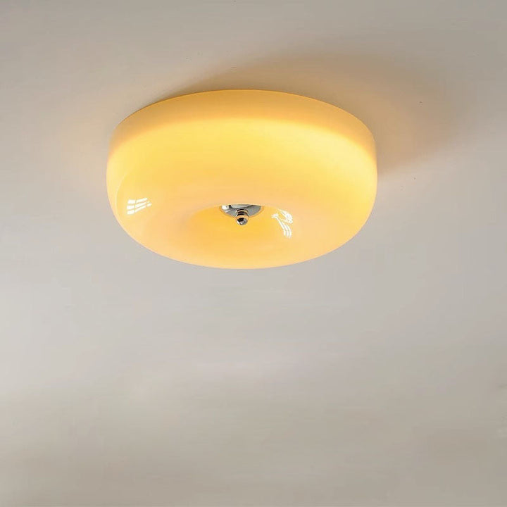 Zeitgenössische nordische cremige gelbe Pudding-Glas-Schirm Eisen LED Deckenleuchte für das Wohnzimmer 