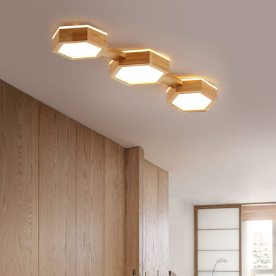 Moderne einfache LED-Deckenleuchte mit sechseckiger Geometrie aus Holz