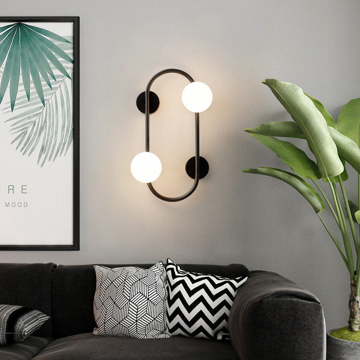 Aplique de pared contemporáneo nórdico de hierro con bola de cristal y aro ovalado de 2 luces para sala de estar 