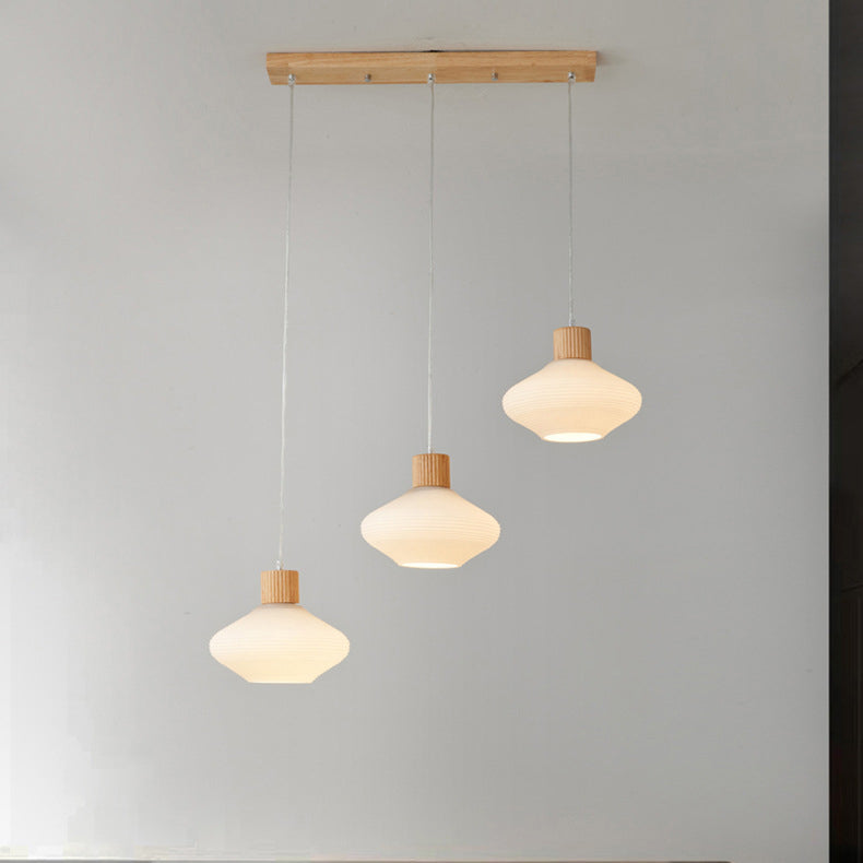 Moderne minimalistische ovale Inselleuchte aus Glas, Gummibaumholz und Metall, 1/3-flammiger Kronleuchter für das Esszimmer 