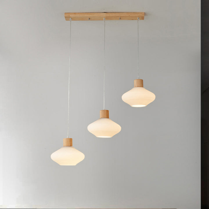 Moderne minimalistische ovale Inselleuchte aus Glas, Gummibaumholz und Metall, 1/3-flammiger Kronleuchter für das Esszimmer 
