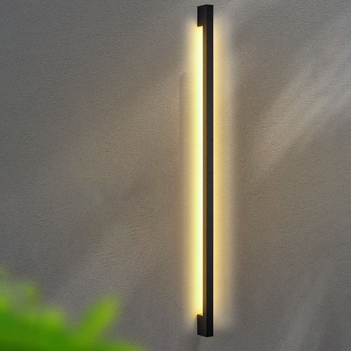 Aplique de pared LED moderno de estilo minimalista con tira larga de hierro y silicona para sala de estar 