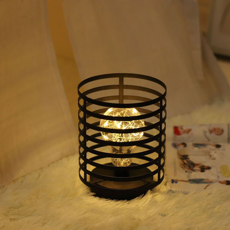 Lámpara de mesa de noche LED de batería de hierro con columna redonda simple y creativa 